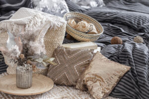 Decorative-pillows-vase-with-dried-flowers-other-elements