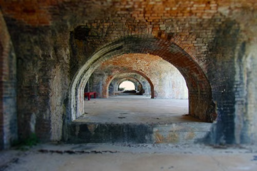 straight down through an arch
